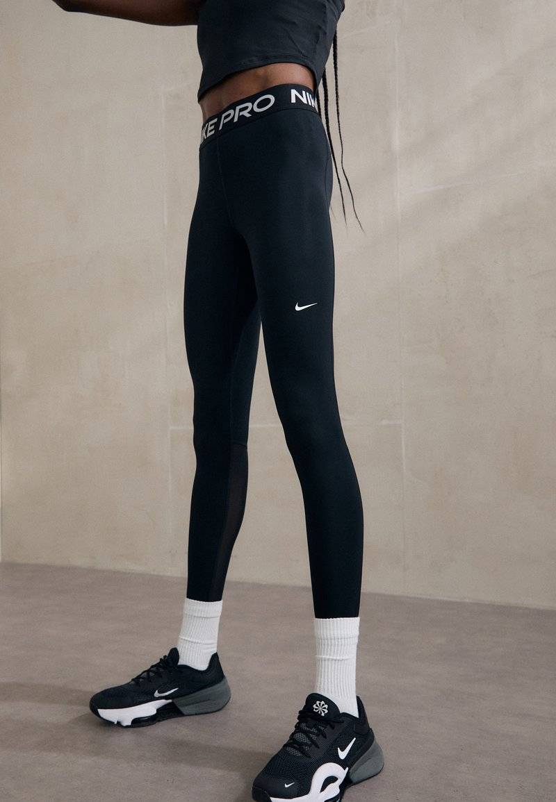 Nike Performance Nike Performance Leggings - black Bis zu 55% Rabatt