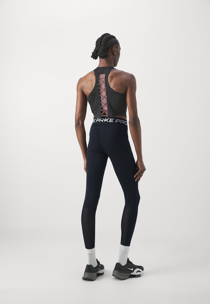 Nike Performance Nike Performance Leggings - black Bis zu 55% Rabatt