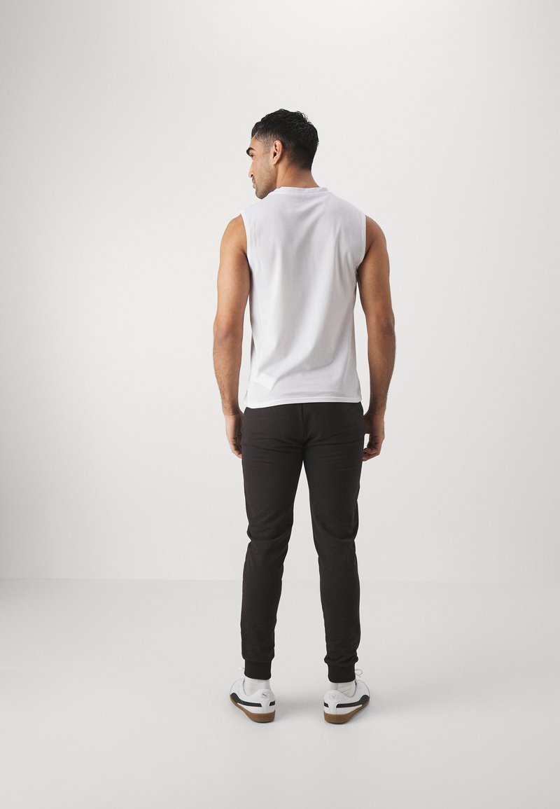 Puma Puma TEAMGOAL SLEEVELESS - Top Neueste Mode