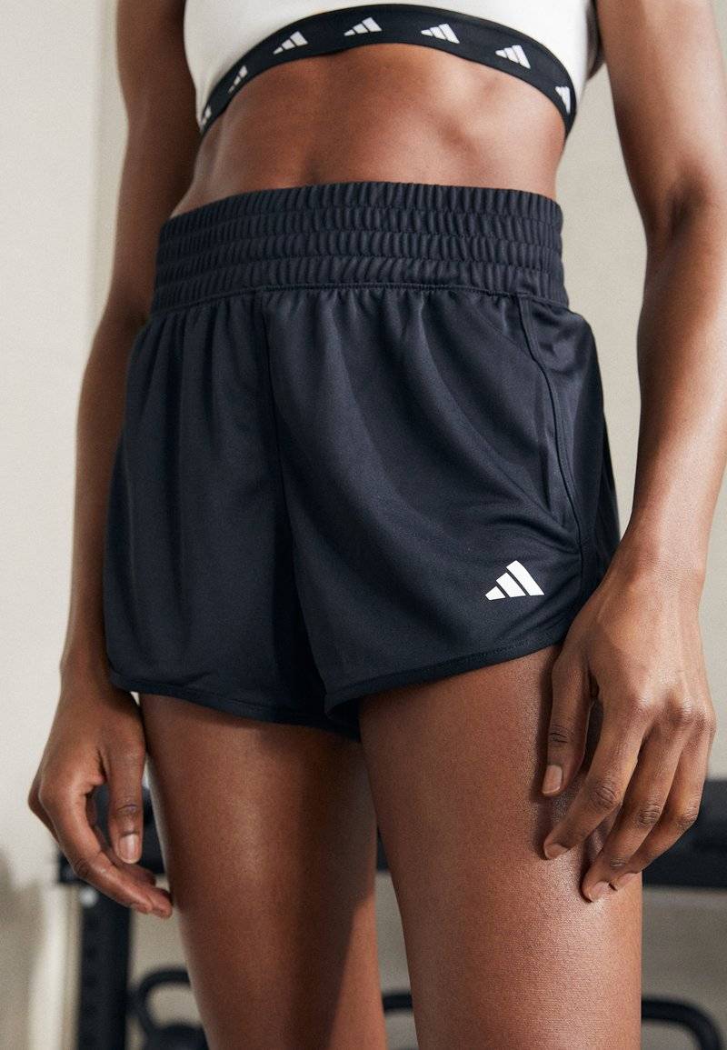 adidas Performance adidas Performance PACER ESSENTIALS SEAMLESS KNIT HIGH-RISE - Sports shorts - black