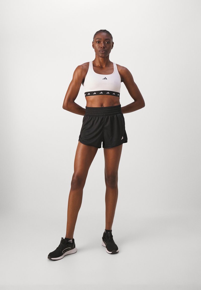 adidas Performance adidas Performance PACER ESSENTIALS SEAMLESS KNIT HIGH-RISE - Sports shorts - black Nur noch ein Tag übrig