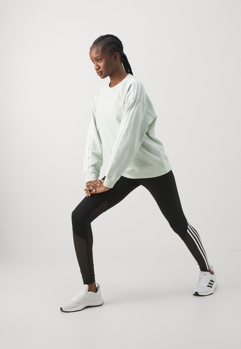 adidas Sportswear adidas Sportswear ESSENTIALS 3 STRIPES - Sweatshirt - linen green zollfrei