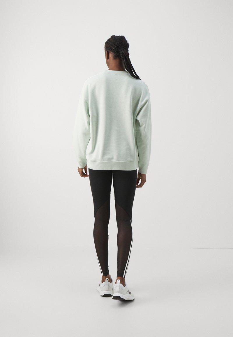 adidas Sportswear adidas Sportswear ESSENTIALS 3 STRIPES - Sweatshirt - linen green zollfrei