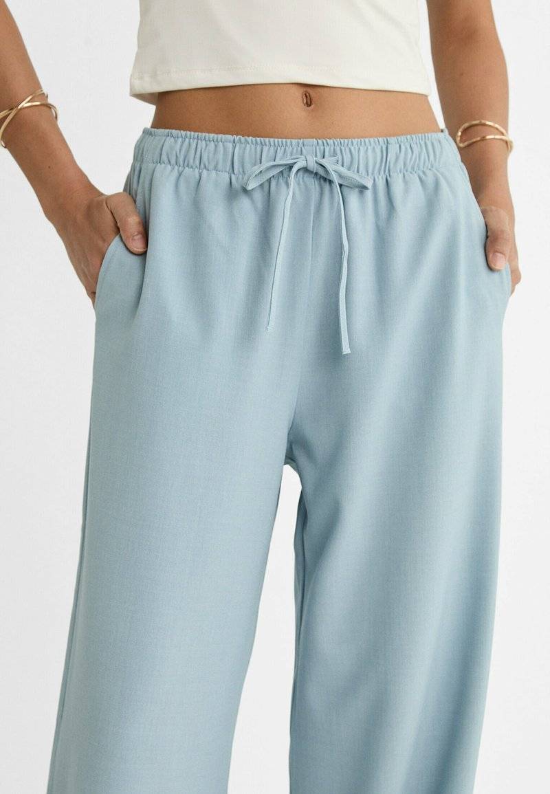 Stradivarius Stradivarius LONG FLOWING - Trousers - light blue Online Shopping